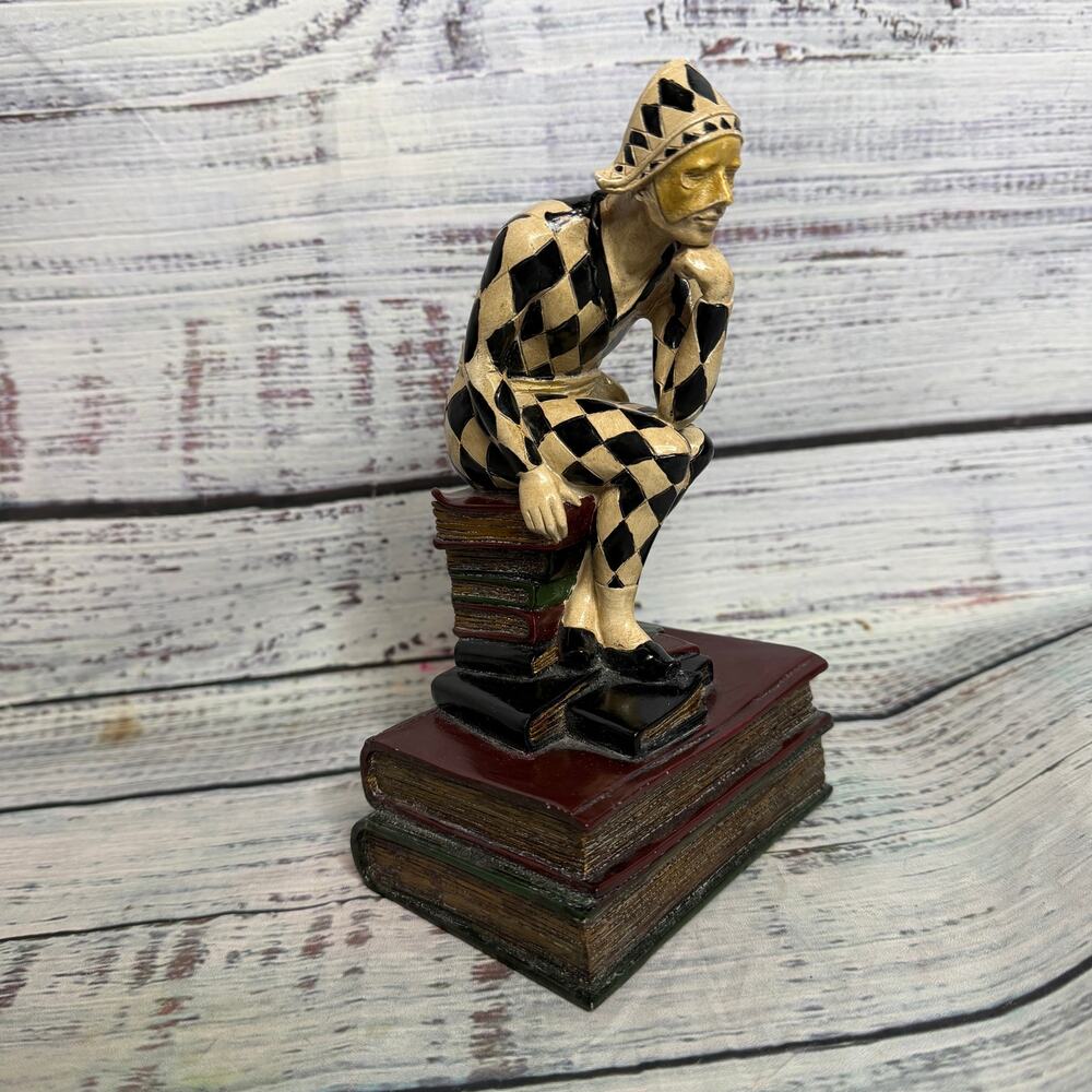 Vintage Harlequin Jester The Thinker Figurine Sitting on Books Black Cream
